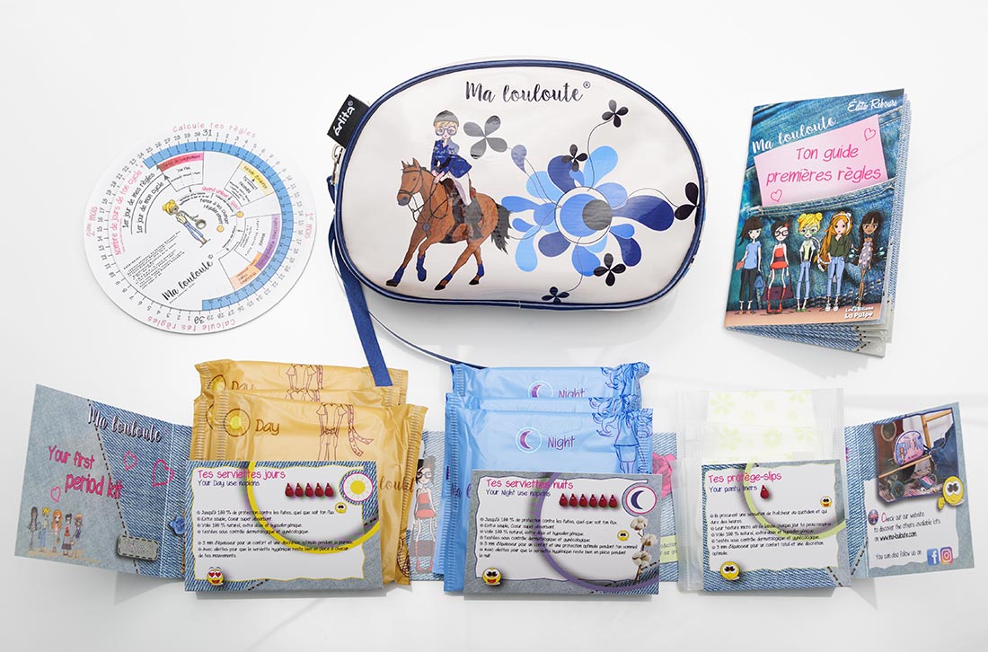 Le kit premières règles ma louloute composé de protections hygieniques guide et calendrier menstruel